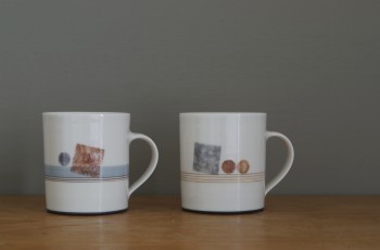 thrown porcelain coffee cups decorated with squares and circles by James and Tilla Waters