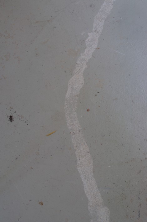 evidence of a spillage of slip on the workshop floor