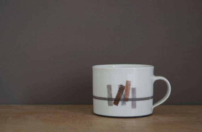 thrown porcelain breakfast mug with rectangles decoration by James and Tilla Waters
