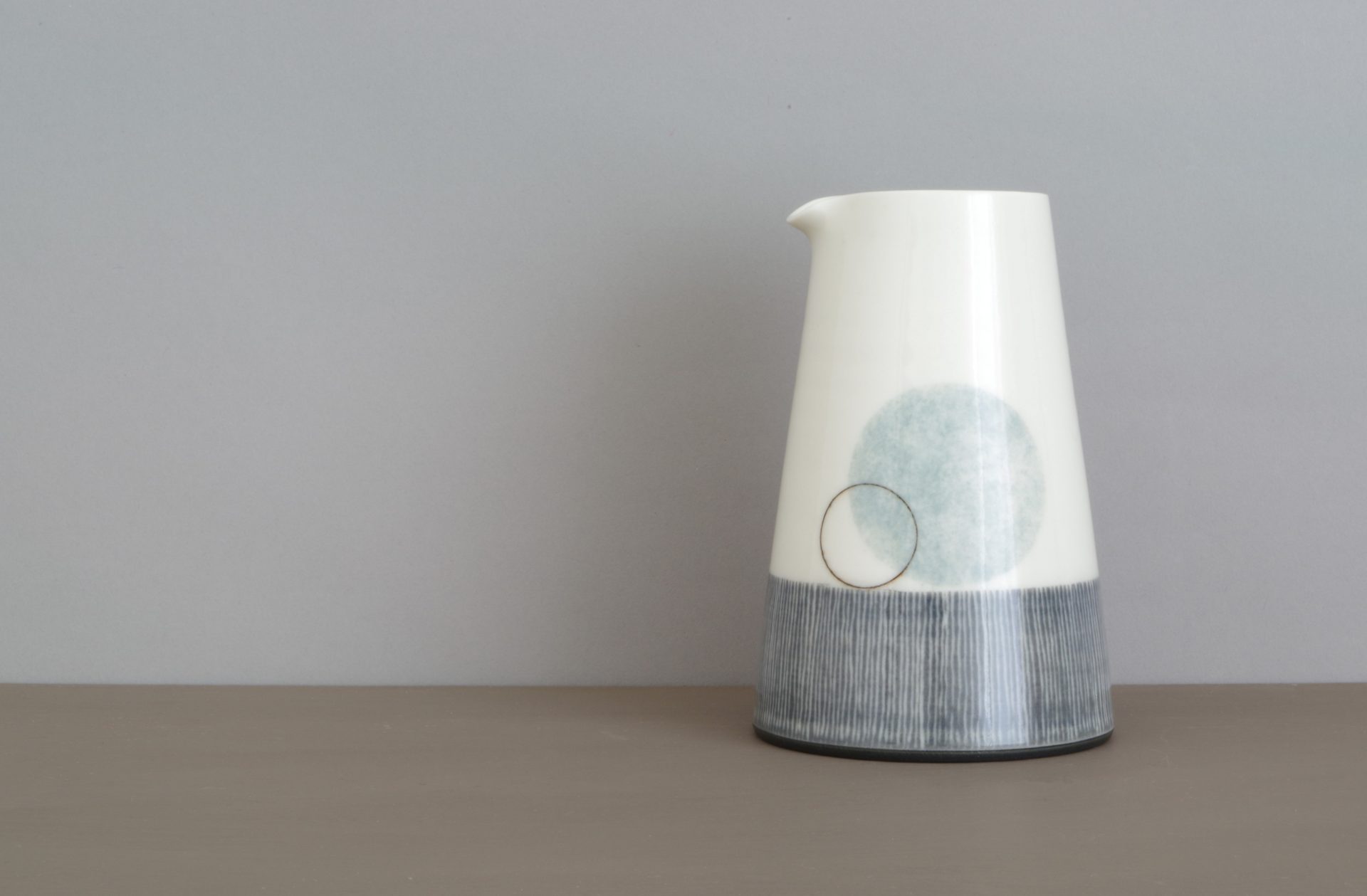 thrown porcelain pourer with circle decoration by James and Tilla Waters