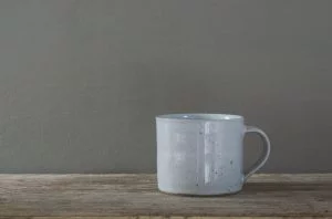 white low coffee cup by James and Tilla Waters