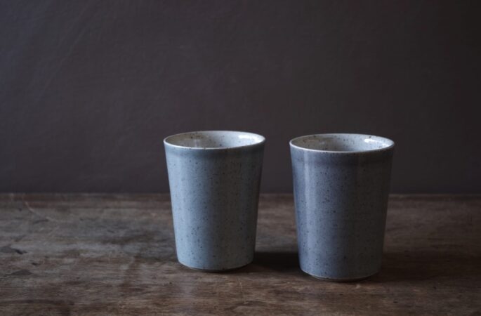 wheel thrown reduction fired stoneware beaker with grey glaze by award winning studio potters James and Tilla Waters in Carmarthenshire, Wales, UK