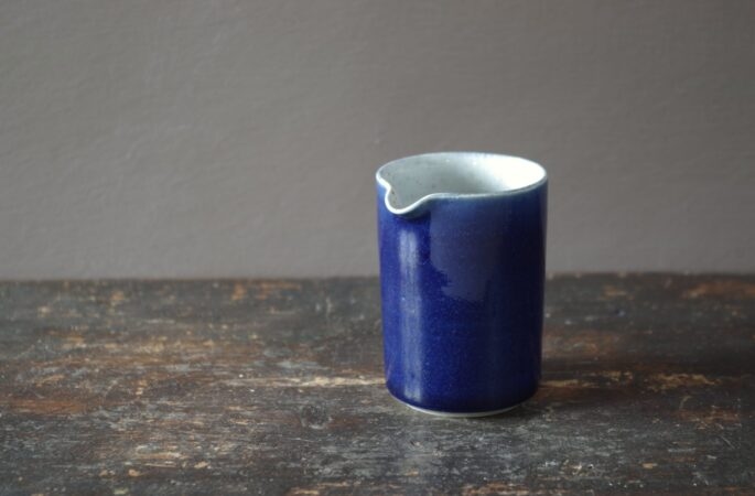 Reduction fired, wheel thrown, stoneware mini pourer with cobalt blue glaze by award winning studio potters James and Tilla Waters in Carmarthenshire, Wales, UK