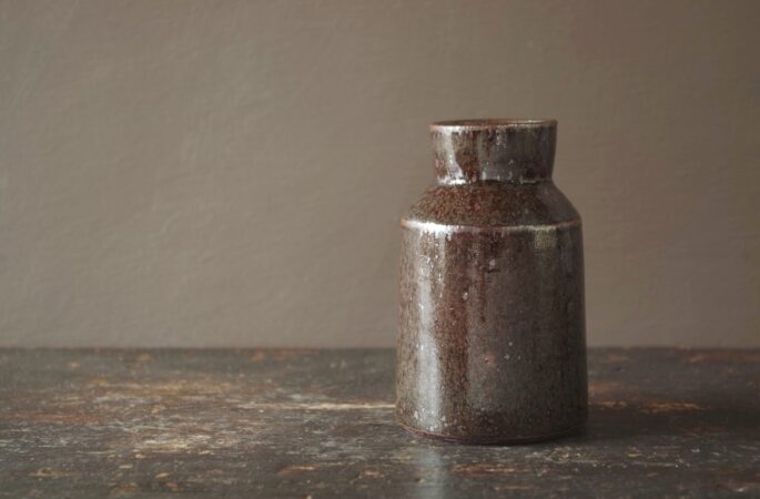 Dark stoneware thrown vase by award winning studio potters James and Tilla Waters in Carmarthenshire, Wales, UK