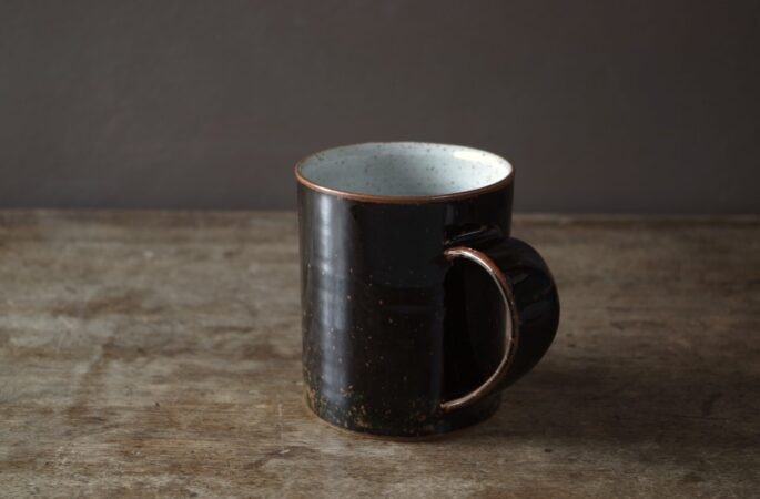 wheel thrown, reduction fired stoneware large mug with tenmoku glaze by award winning potters James and Tilla Waters in Carmarthenshire, Wales, UK