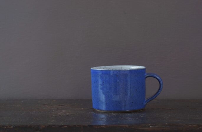 Wheel thrown stoneware breakfast mug with cobalt blue glaze by award winning potters James and Tilla Waters in Carmarthenshire, Wales, UK