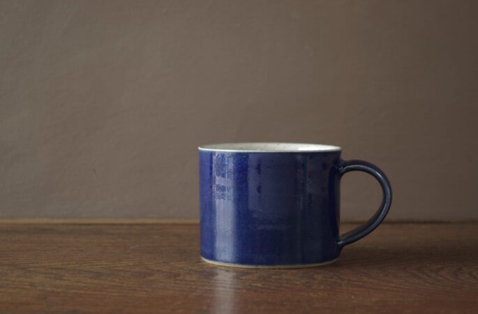 Wheel thrown stoneware breakfast mug with cobalt blue glaze by award winning potters James and Tilla Waters in Carmarthenshire, Wales, UK