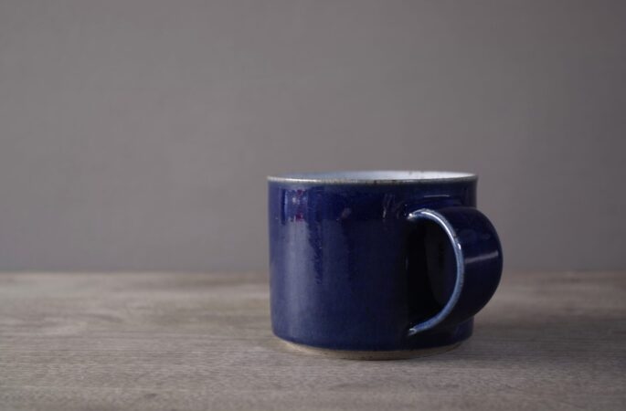 Wheel thrown stoneware breakfast mug with cobalt blue glaze by award winning potters James and Tilla Waters in Carmarthenshire, Wales, UK