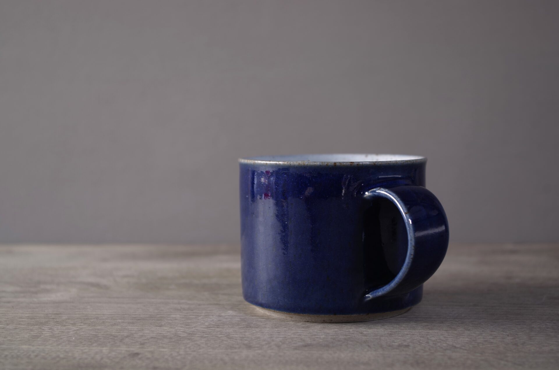 Wheel thrown stoneware breakfast mug with cobalt blue glaze by award winning potters James and Tilla Waters in Carmarthenshire, Wales, UK