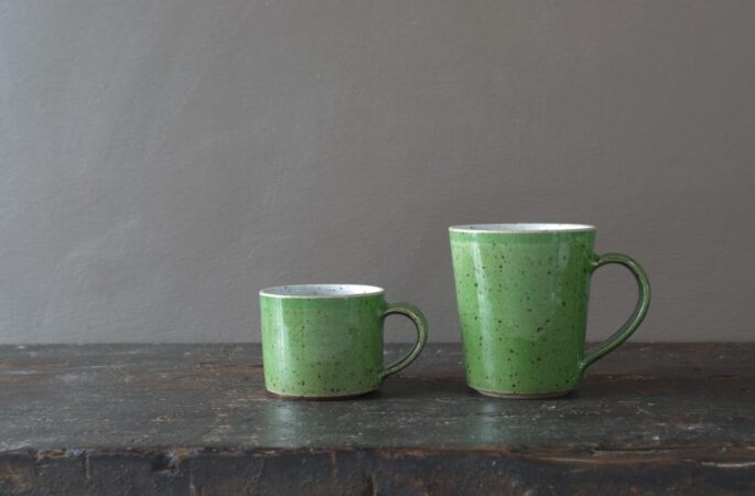 green tall flared coffee cup