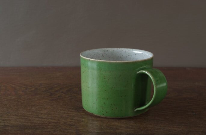 reduction fired stoneware large breakfast mug with green glaze by award winning potters James and Tilla Waters in Carmarthenshire, Wales, UK