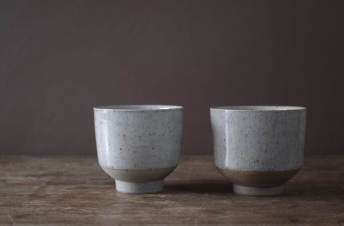 wheel thrown, reduction fired stoneware tea bowl with clear (pale grey) glaze by award winning potters James and Tilla Waters in Carmarthenshire, Wales, UK