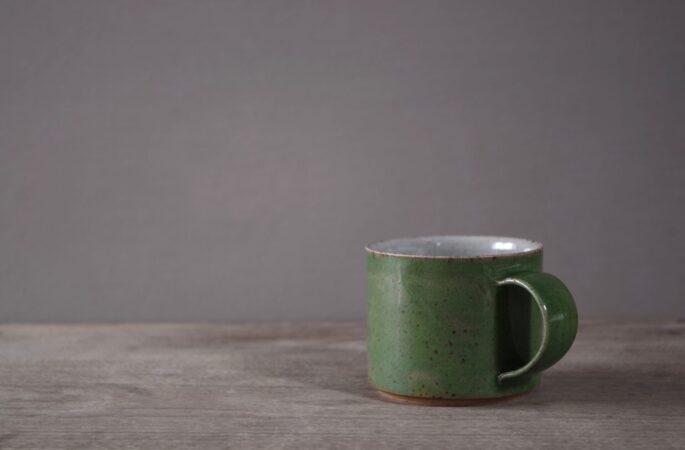 green low coffee cup