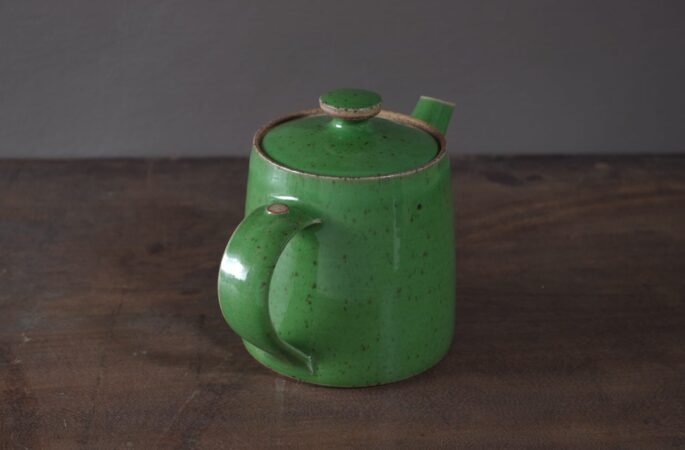 wheel thrown, reduction fired stoneware teapot with pulled handle and green glaze by award winning potters James and Tilla Waters in Carmarthenshire, Wales, UK
