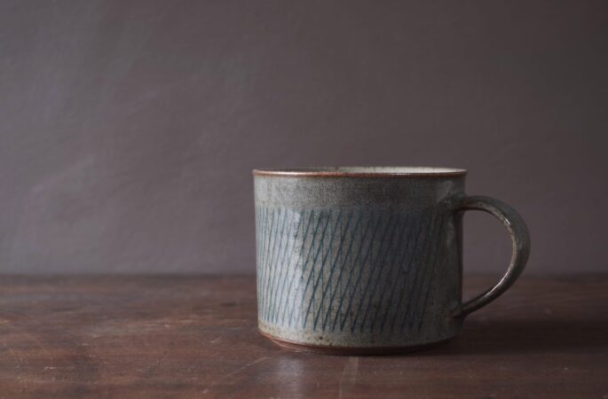 wheel thrown, reduction fired large stoneware breakfast mug with inlaid geometric decoration and pulled handle by award winning potters James and Tilla Waters in Carmartheshire, Wales, UK