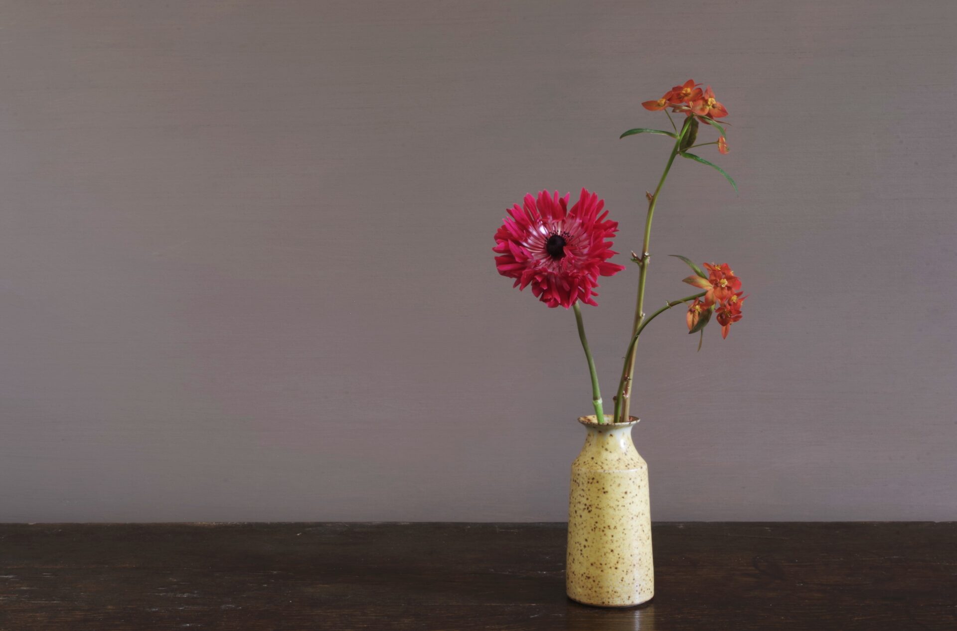 wheel thrown stoneware vase with yellow glaze, reduction fired by award winning potters James and Tilla Waters in Carmarthenshire, Wales, UK