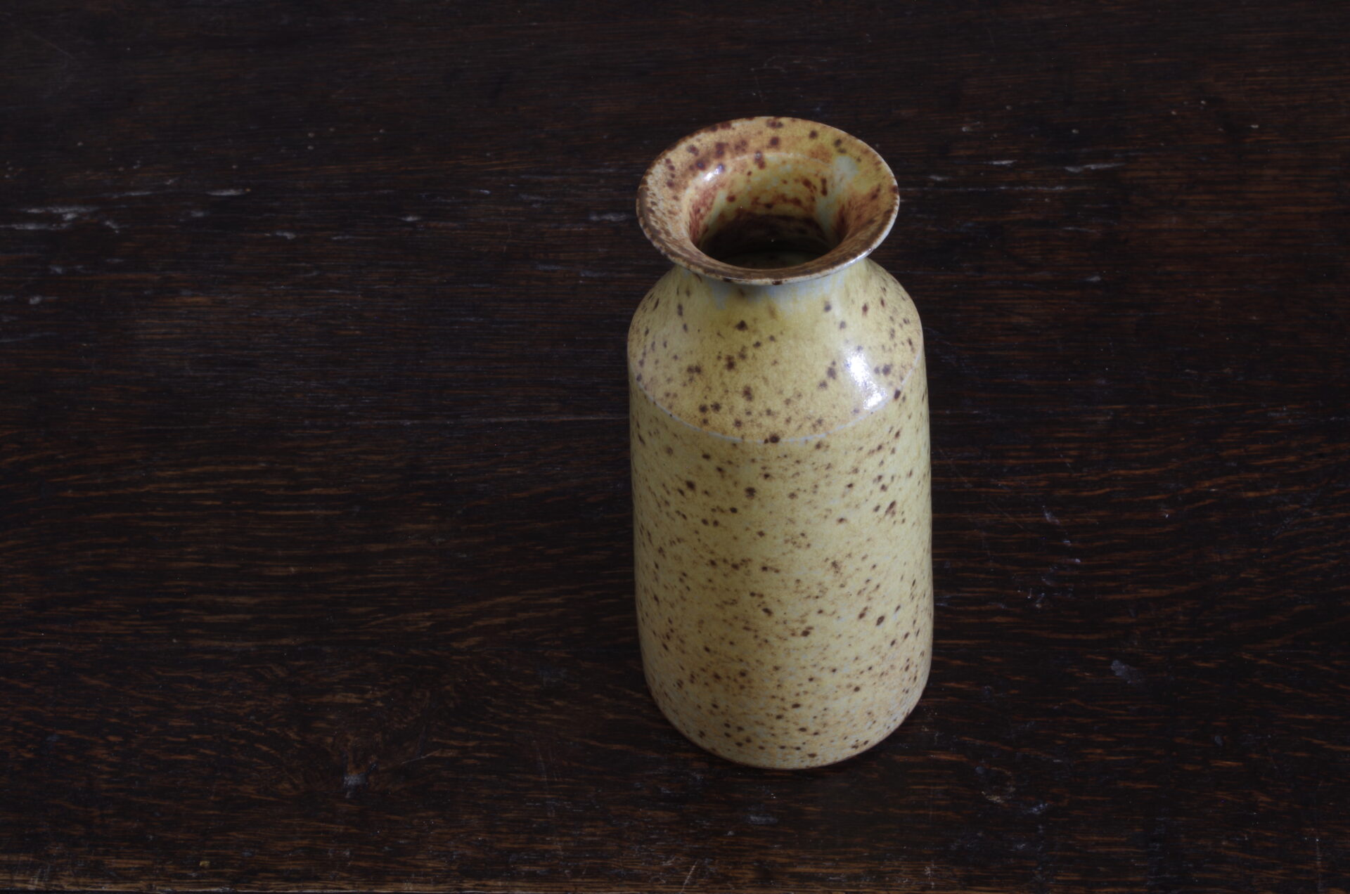 wheel thrown stoneware vase with yellow glaze, reduction fired by award winning potters James and Tilla Waters in Carmarthenshire, Wales, UK