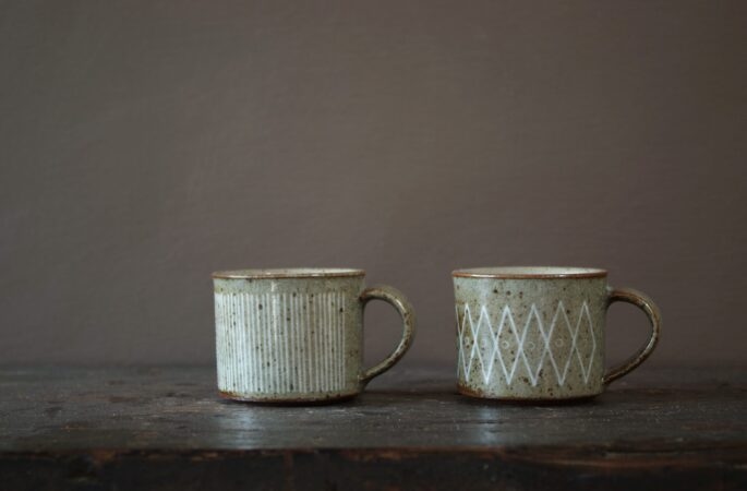 Reduction fired, wheel thrown, stoneware espresso coffee cup with pulled handle and hand decorated with inlay by award winning studio potters James and Tilla Waters in Carmarthenshire, Wales, UK