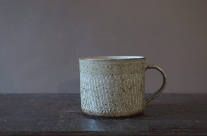 Reduction fired, wheel thrown, stoneware large breakfast mug with pulled handle and hand decorated with inlay by award winning studio potters James and Tilla Waters in Carmarthenshire, Wales, UK