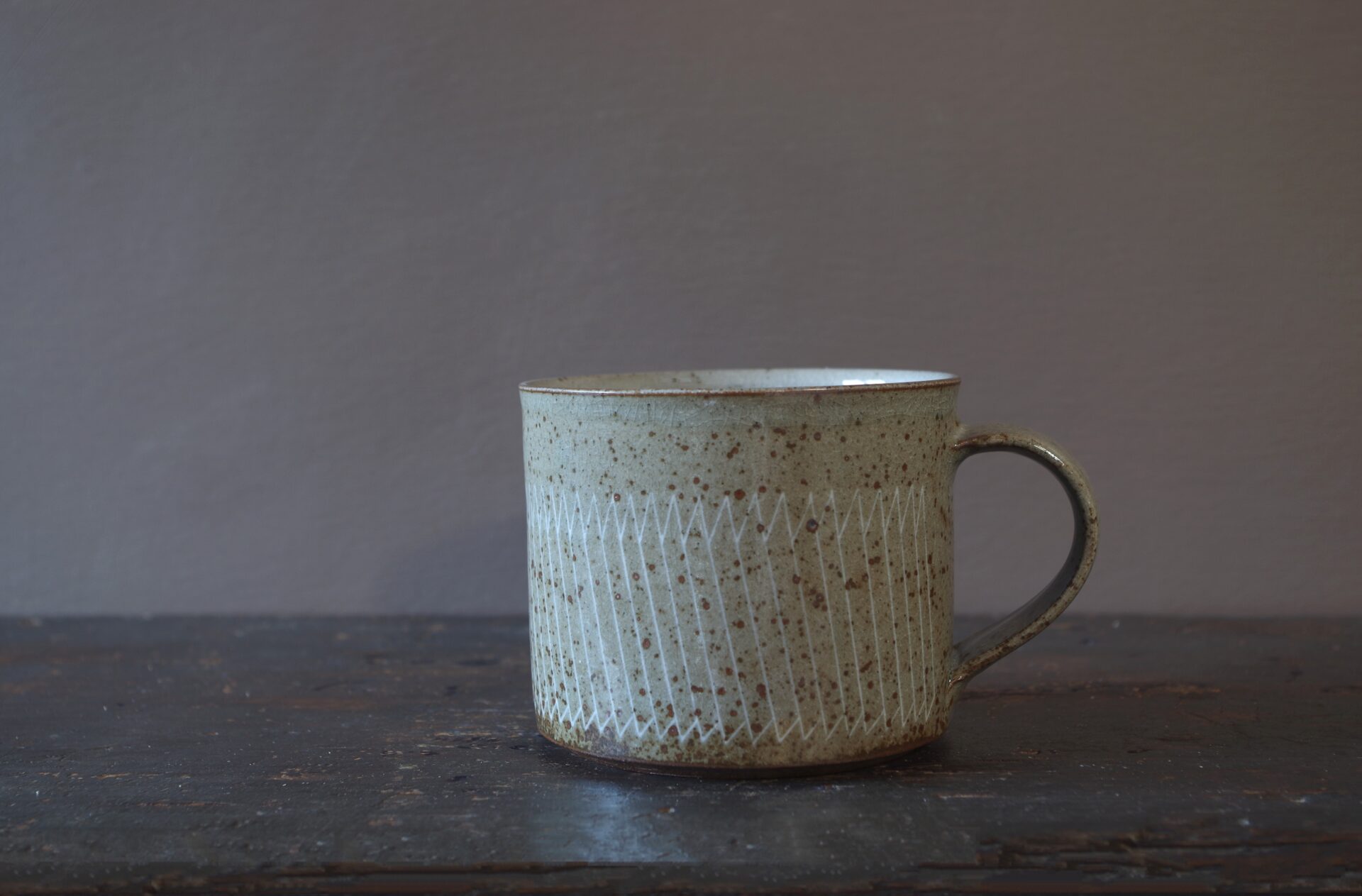 Reduction fired, wheel thrown, stoneware large breakfast mug with pulled handle and hand decorated with inlay by award winning studio potters James and Tilla Waters in Carmarthenshire, Wales, UK