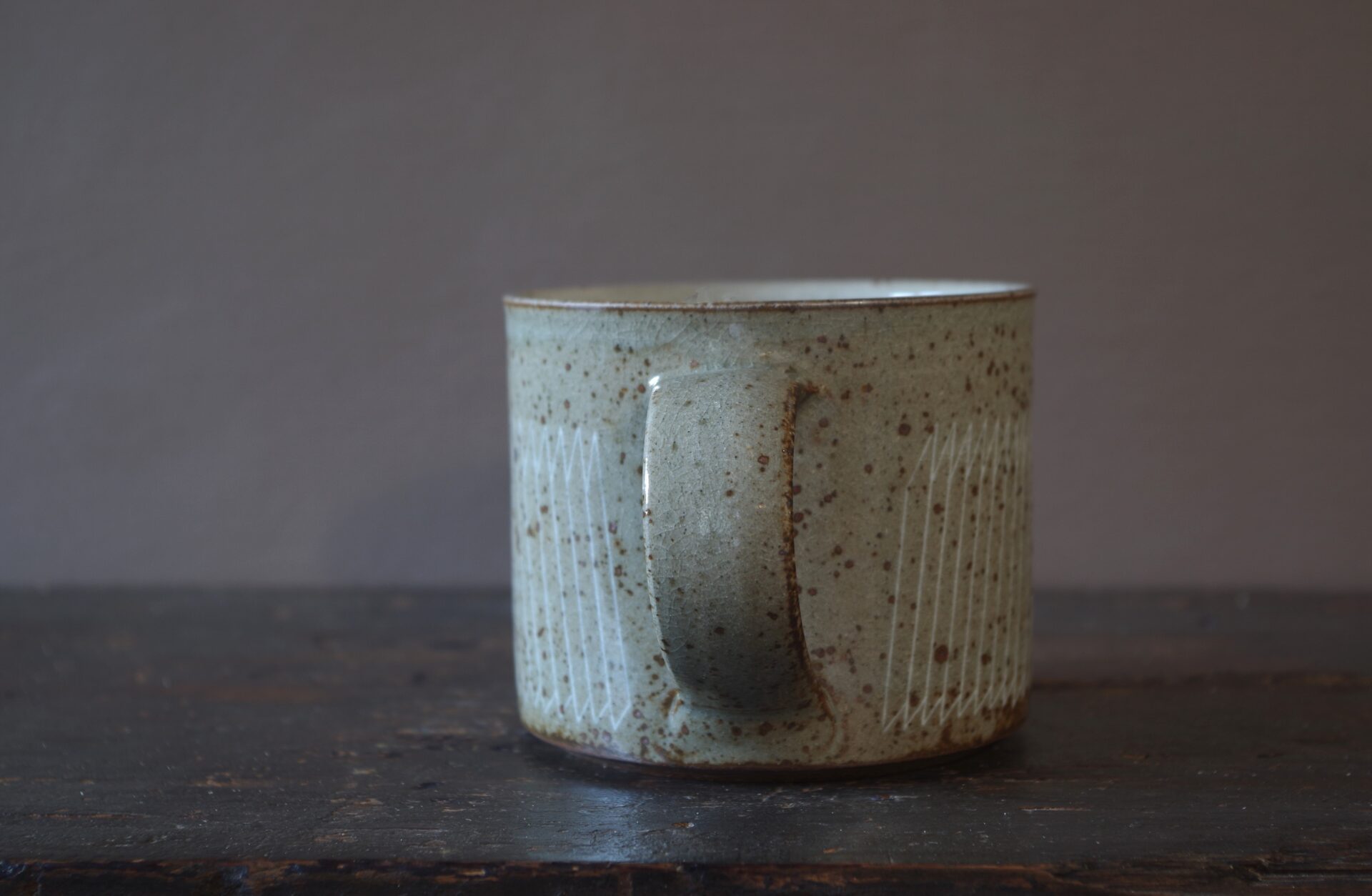Reduction fired, wheel thrown, stoneware large breakfast mug with pulled handle and hand decorated with inlay by award winning studio potters James and Tilla Waters in Carmarthenshire, Wales, UK