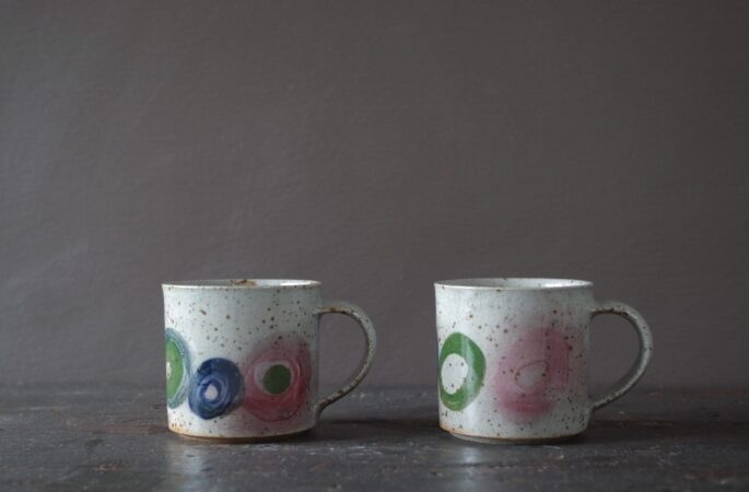 Reduction fired, wheel thrown, stoneware coffee can with pulled handle and hand decorated by award winning studio potters James and Tilla Waters in Carmarthenshire, Wales, UK