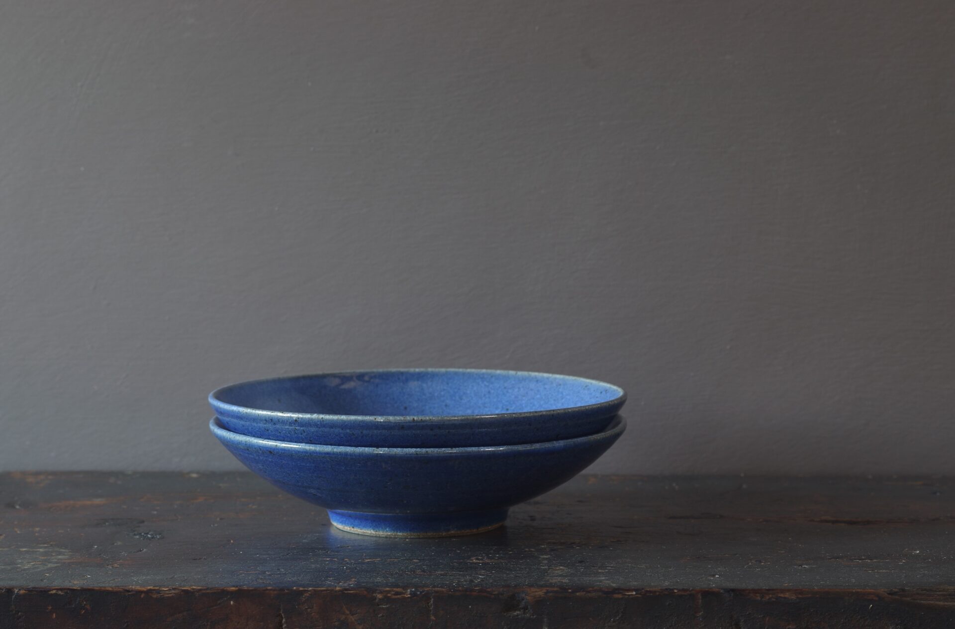 reduction fired, thrown stoneware open bowl with blue chun glaze by award winning potters James and Tilla Waters in Carmarthenshire, Wales, UK