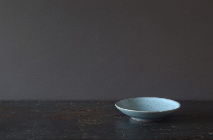 reduction fired, thrown stoneware open mini bowl with pale blue chun glaze by award winning potters James and Tilla Waters in Carmarthenshire, Wales, UK