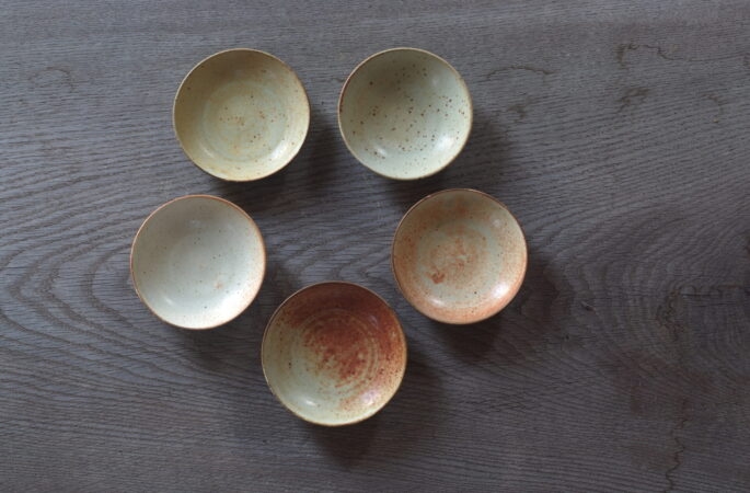 reduction fired, thrown stoneware open mini bowl with soft yellow glaze by award winning potters James and Tilla Waters in Carmarthenshire, Wales, UK