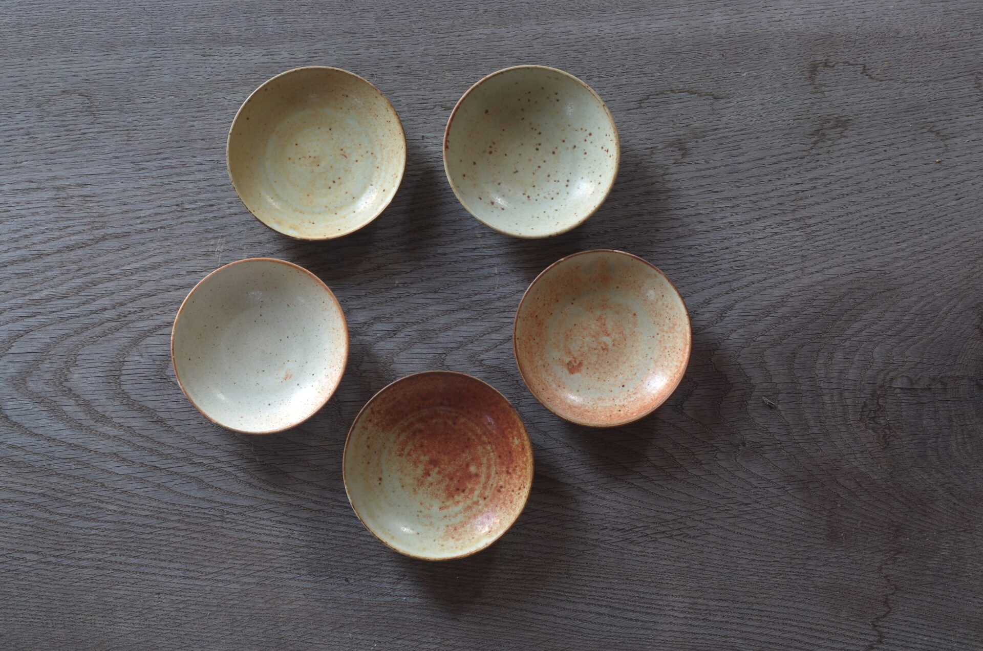 reduction fired, thrown stoneware open mini bowl with soft yellow glaze by award winning potters James and Tilla Waters in Carmarthenshire, Wales, UK