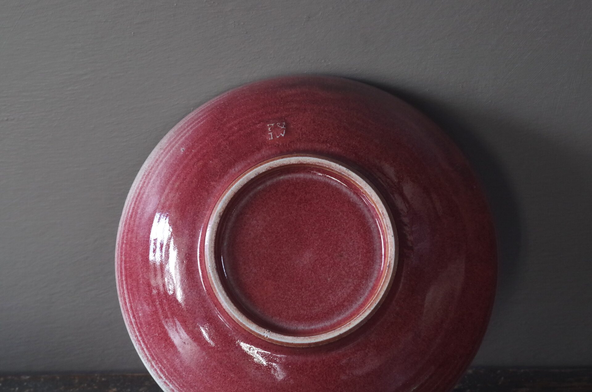 reduction fired, thrown stoneware ramen bowl with copper red glaze by award winning potters James and Tilla Waters in Carmarthenshire, Wales, UK