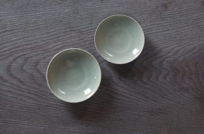 reduction fired, thrown stoneware open mini bowl with pale green crackle glaze by award winning potters James and Tilla Waters in Carmarthenshire, Wales, UK