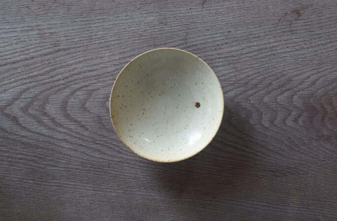 reduction fired, thrown stoneware open bowl with soft yellow glaze by award winning potters James and Tilla Waters in Carmarthenshire, Wales, UK